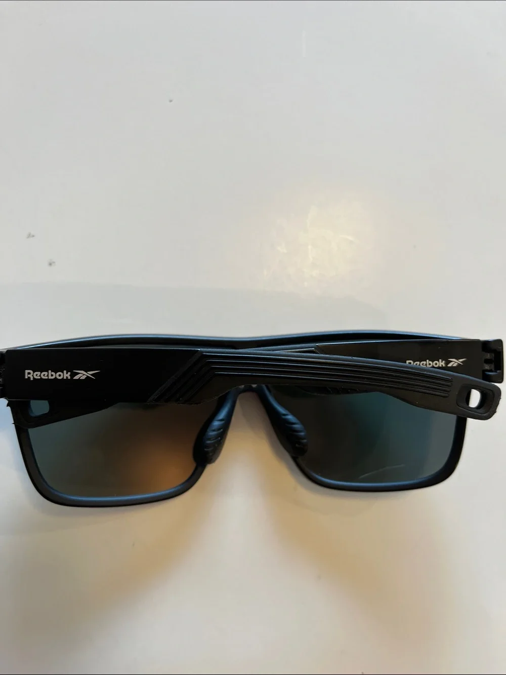 Reebok Black Frame Sunglasses with Red-Gold Mirrored Lens